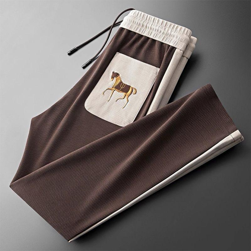 Effortless Style & Comfort Drawstring Pants with Stunning Embroidered Horse Accent